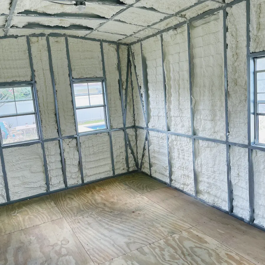 Closed-cell spray foam insulation applied to wall cavities in a residential project in Brambleton